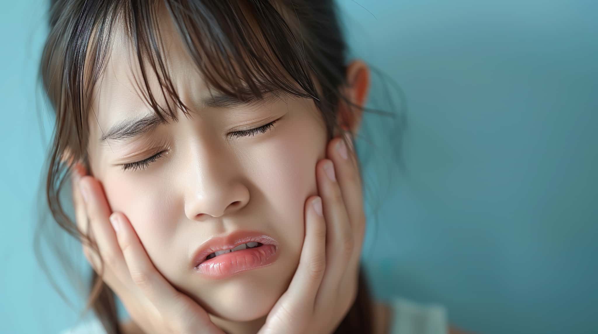 親知らずが酷く痛む女性